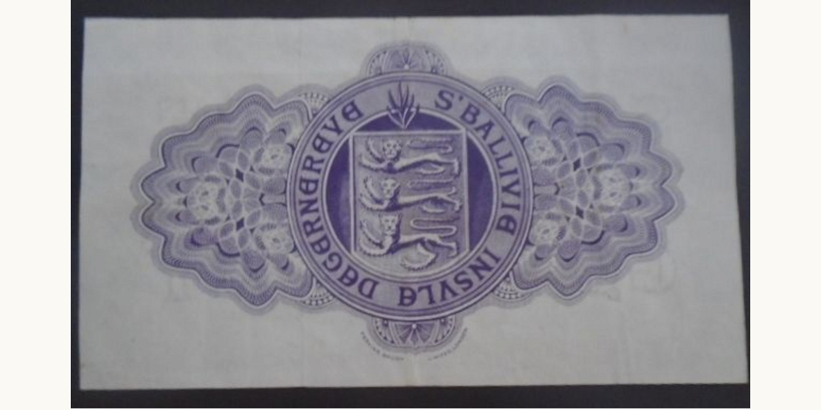 10 shilling Гернси 1966 — Оборотная сторона