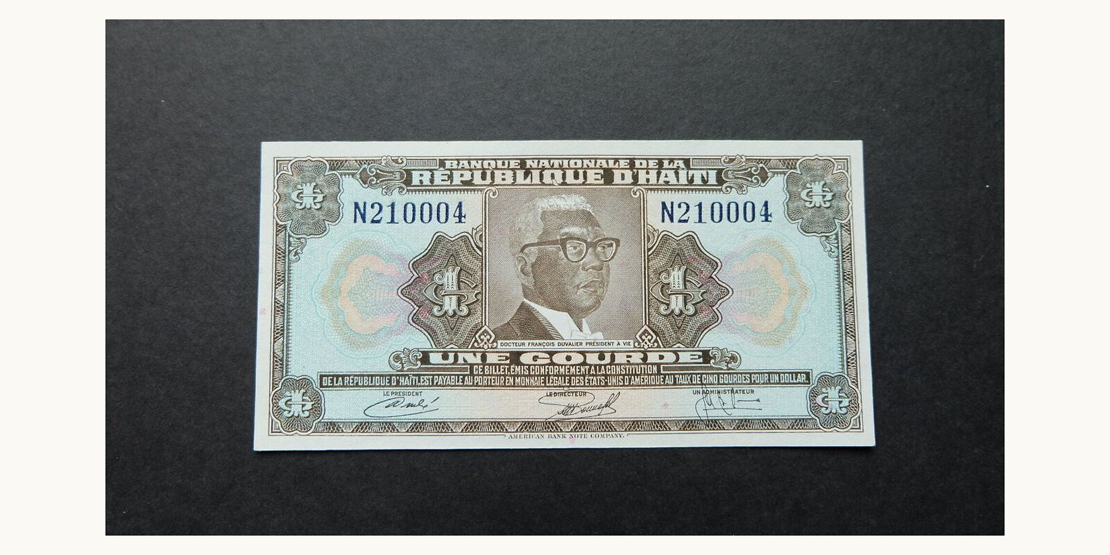 1 gourde Гаити 1973 — Лицевая сторона